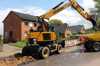MX18G Rear Right Side View Loading Dump Truck