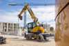 MX16G Transporting Heavy Concrete Pipe Through Construction Site